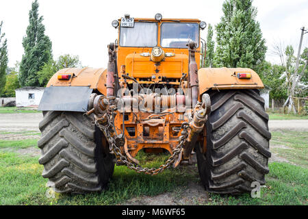 Russia, Temryuk - 15 July 2015: Big tractor. Old Soviet agricultural machinery Stock Photo