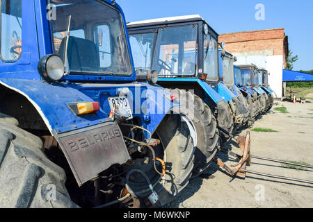 Russia, Temryuk - 15 July 2015: Tractor. Agricultural machinery tractor. Parking of tractor agricultural machinery. The picture was taken at a parking Stock Photo