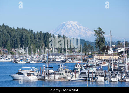 Gig Harbor Washington with Mount Rainier in background boats in the foreground. Stock Photo