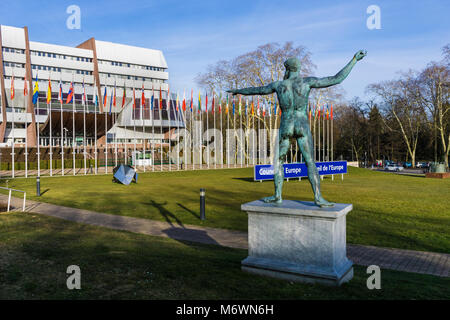 Main lawn of the Council of Europe headquarters with the statue of the Greek god Poseidon in the foreground, Strasbourg, France. Stock Photo