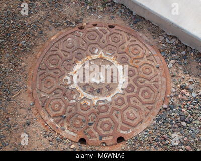 Old Bell System labeled manhole cover in Florence, Arizona Stock Photo