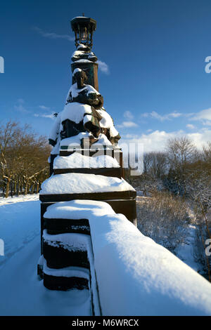 Bronze statues on Kelvin Way Bridge Glasgow covered in snow after heavy snow storm