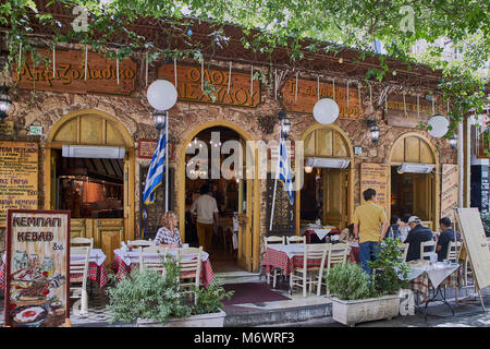 Europe, Greece, around the Central market, Colorful tables and chairs in sidewalk restaurant, Athens Stock Photo