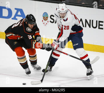 Los Angeles, California, USA. 6th Mar, 2018. Anaheim Ducks' defenseman Kevin Bieksa (3) vies with Washington Capitals' forward Lars Eller (20) during a 2017-2018 NHL hockey game in Anaheim, California on March 6, 2018. The Ducks won 4-0. Credit: Ringo Chiu/ZUMA Wire/Alamy Live News Stock Photo