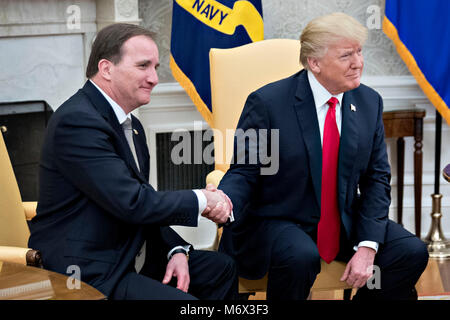 President Donald Trump, right, shakes hands with U.S. Army Master Sgt ...