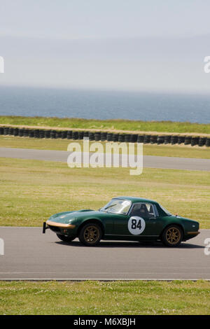 Green Lotus Elan speeding around the Anglesey motor racing circuit, Ty Croes, Anglesey, Wales, June Stock Photo