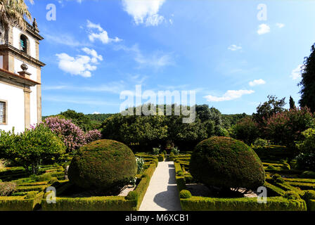 View of the tailored boxwood hedges of the Mateus Palace gardens, in Vila Real, Portugal Stock Photo