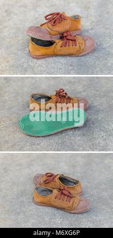 old thai student brown shoes on the concrete floor Stock Photo