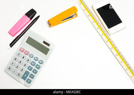 Isolated office tool on white background - pen, highlight pen, cellphone; ruler, pencil, calculator and stabler Stock Photo