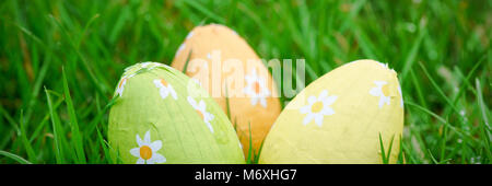 Three easter eggs in the grass Stock Photo