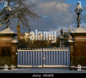 Gates to Kelvingrove Park covered in snow after blizzard in March 2018 Stock Photo