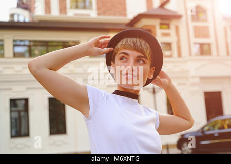 Woman enjoying a beautiful day in the city  Stock Photo