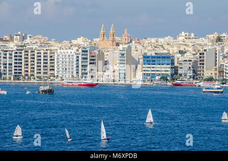 Gzira, Malta - November 8, 2015:Gzira, a town located in Marsamxett Harbour, as seen from Valletta. Waterfront and densely built-over modern buildings Stock Photo