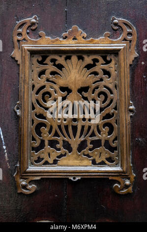 Spyhole of wooden door, Cordoba, Andalucia, Spain Stock Photo