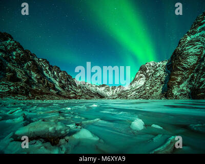 Northern light over the islands of Lofoten. Stock Photo