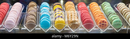 Sweet and colourful french macaroons in a row, Dessert / sweet/ tasty Stock Photo