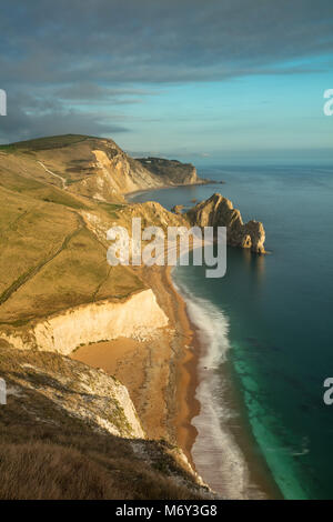 Aerial view of Durdle Door limestone arch on the Jurassic Coast with ...