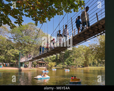 Square view of people in pedaloes in Viharamahadevi Park, formerly known as Victoria Park in Colombo, Sri Lanka. Stock Photo