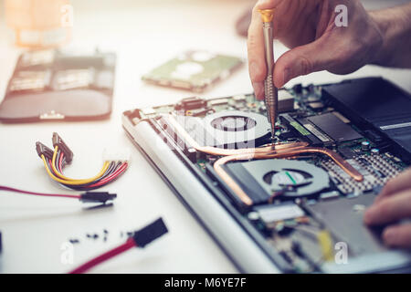 technician repairing laptop computer closeup Stock Photo