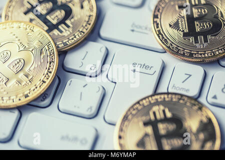 Bitcoins. Bitcoin symbol on laptop, currency, crypto currency sign. Stock Photo