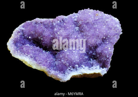 Pure Amethyst Crystal cluster on black background. This is a huge specimen from a mineral museum. Stock Photo
