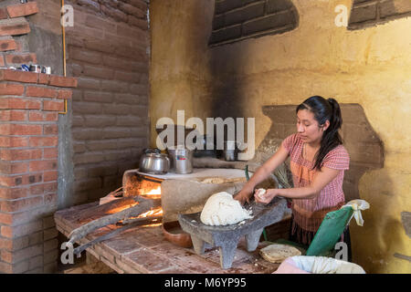 Cuilapam de Guerrero, Oaxaca, Mexico - A worker makes tortillas at Hacienda Cuilapam, a popular buffet restaurant. Stock Photo