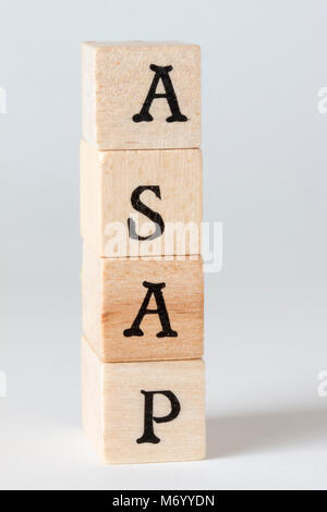 ASAP word made with building blocks,as soon as possible Stock Photo
