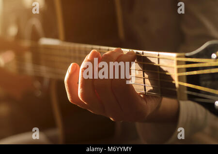 playing acoustic guitar Stock Photo