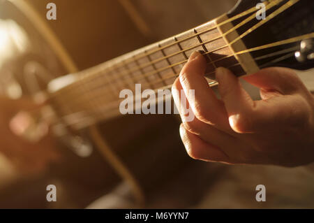 playing acoustic guitar Stock Photo