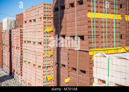 Piles of bricks for sale at brick yard Stock Photo