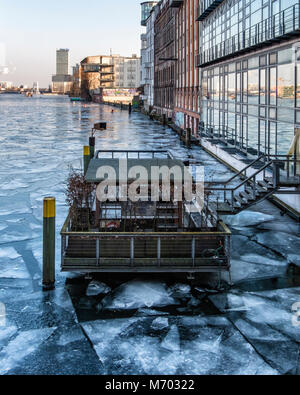 Germany ,Berlin, Watergate club Nightclub & River terrace.Frozen river Spree in Winter with Ice Floes Stock Photo