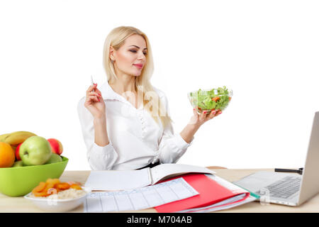 dietician making a diet of fruits and vegetables Stock Photo
