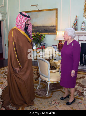 Queen Elizabeth II greets Mohammed bin Salman, the Crown Prince of Saudi Arabia, during a private audience at Buckingham Palace in London. Stock Photo