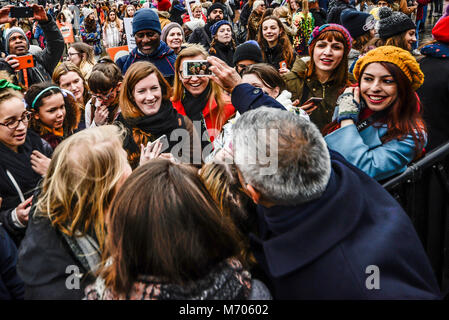 Sadiq Khan Mayor of London meeting the public  after the March 4 Women equality protest rally in Trafalgar Square. Taking a selfie with fans Stock Photo