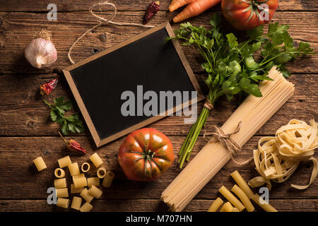 Italian food cooking ingredients. Pasta, vegetables. Top view with copy space Stock Photo