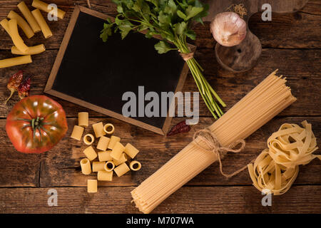 Italian food cooking ingredients. Pasta, vegetables. Top view with copy space Stock Photo