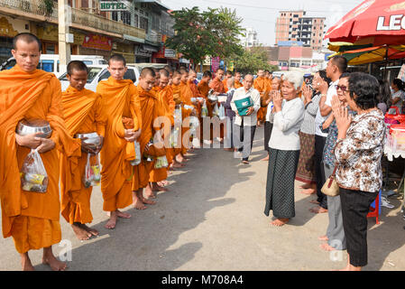 Battambang, Cambodia - 15 January 2018: monks during food gathering at Battambang on Cambodia Stock Photo