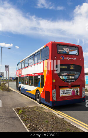 Stagecoach no. 38 service bus parked at the end of its route at Logistics North Distribution and Business Park, Bolton. Stock Photo