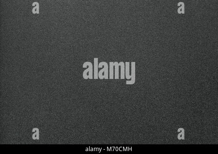Grainy Texture of Black Plastic for Office Folders. Black Grainy Plastic Background Close-Up Stock Photo