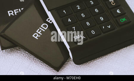 TAN generator and RFID protection sleeves for your secure credit cards agains hacker attack Stock Photo