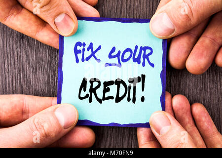 Handwriting Announcement text showing Fix Your Credit. Conceptual photo Bad Score Rating Avice Fix Improvement Repair written Sticky Note Paper Holdin Stock Photo