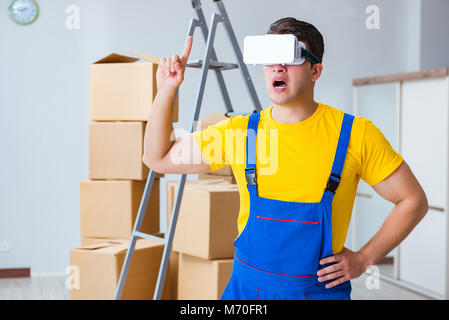 Painter contractor working with virtual reality goggles Stock Photo