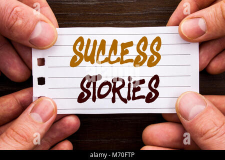 Handwritten text sign showing Success Stories. Business concept for Successful Inspiration Achievement Education Growth written Sticky Note Paper Hold Stock Photo