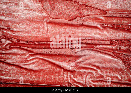 Red bumpy wall stucco texture background, crumpled leather imitation Stock Photo