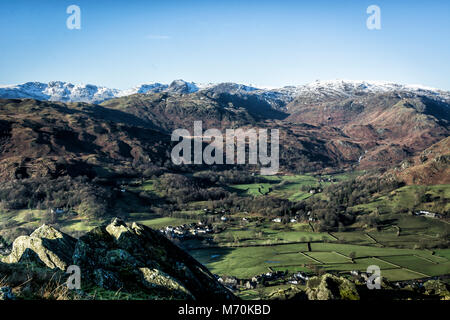 View of Langdales and Crinkle Crags, Grasmere from near Alcock tarn Stock Photo