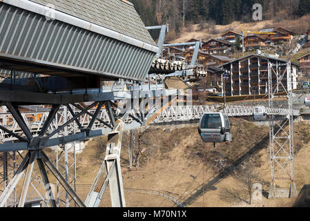 A Gondola Running Alongside a Suspension Bridge Walkway in the Ski Resort of Morzine Portes du Soleil Haute Savoie France Stock Photo