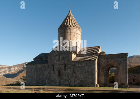 The Tatev Monastery is a 9th-century monastery located on a large basalt plateau near the Tatev village in Syunik Province in southeastern Armenia. Stock Photo