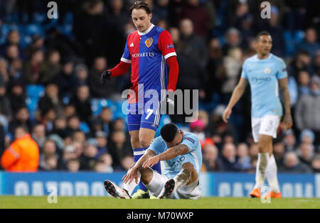 Manchester City's Gabriel Jesus (right) lies dejected next to FC Basel's Luca Zuffi during the UEFA Champions League round of 16, second leg match at the Etihad Stadium, Manchester. PRESS ASSOCIATION Photo. Picture date: Wednesday March 7, 2018. See PA story soccer Man City. Photo credit should read: Martin Rickett/PA Wire Stock Photo