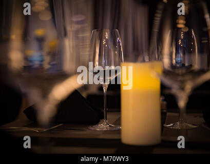 Bunch of Wine Glasses with Focus on One Stock Photo
