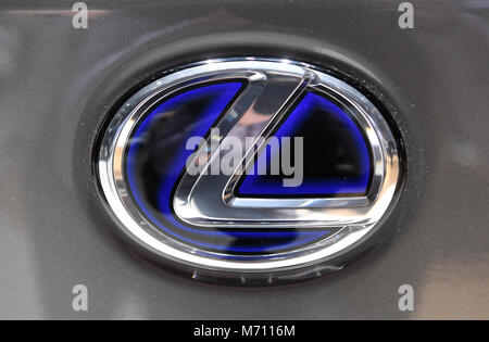 07 March 2018, Switzerland, Geneva: The logo of carmaker Lexus is displayed during the 2nd Press Day at the 2018 Geneva Motor Show. The Geneva Motor Show runs from 8 March to 18 March 2018. Credit: dpa picture alliance/Alamy Live News Stock Photo